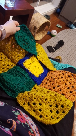 Crocheted squares for a charity blanket from school.
